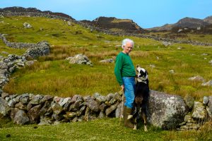Mairtin Moran with his dog Finn, Clare Island, Co Mayo, Ireland